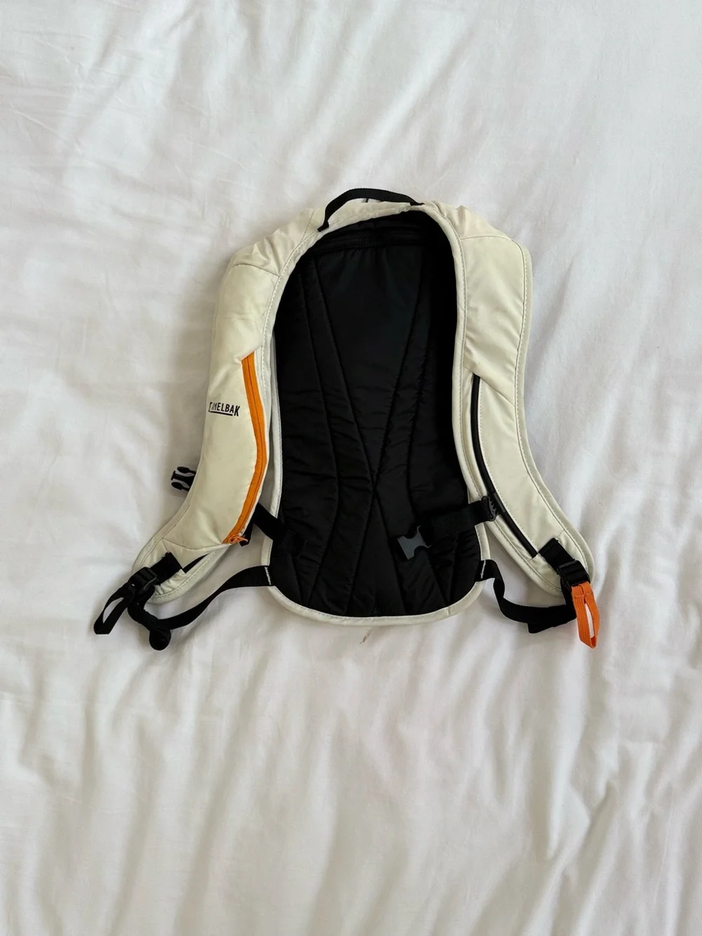 CamelBak Cream Hydration Backpack with Orange Detail